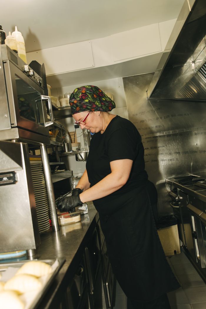 Chef plating dishes in a restaurant kitchen